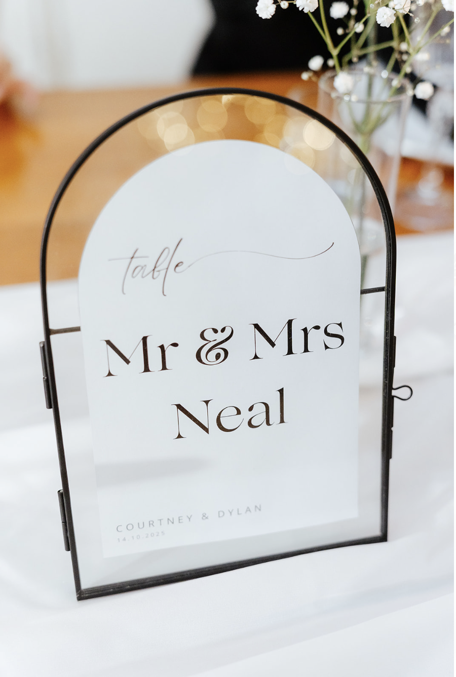 Wedding details sign at a reception